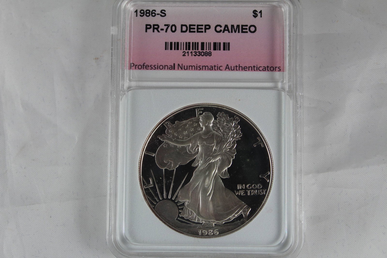 1986-S PR-70 Deep Cameo Silver Eagle: This Silver Eagle is graded by PNA as a 1986-S PR-70 Deep Cameo $1 Coin. Specs of a 1986 Silver Eagle coin according to NGC are as follows: Category: Silver Eagles (1986-Date) Mint: Philadelphia Minta