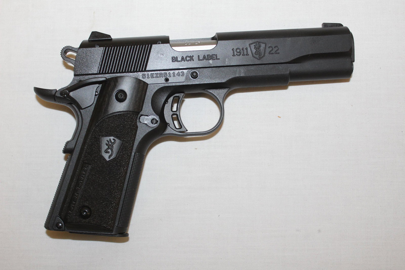 Browning 1911-22 22LR Autoloading Rimfire Pistol: This is a brand new, in the case, Browning 1911-22 22LR Autoloading Rimfire Pistol with a black laminated grip, fixed sights and a 4.25 inch long barrel. Serial Number 1BH072028. Please make sure that