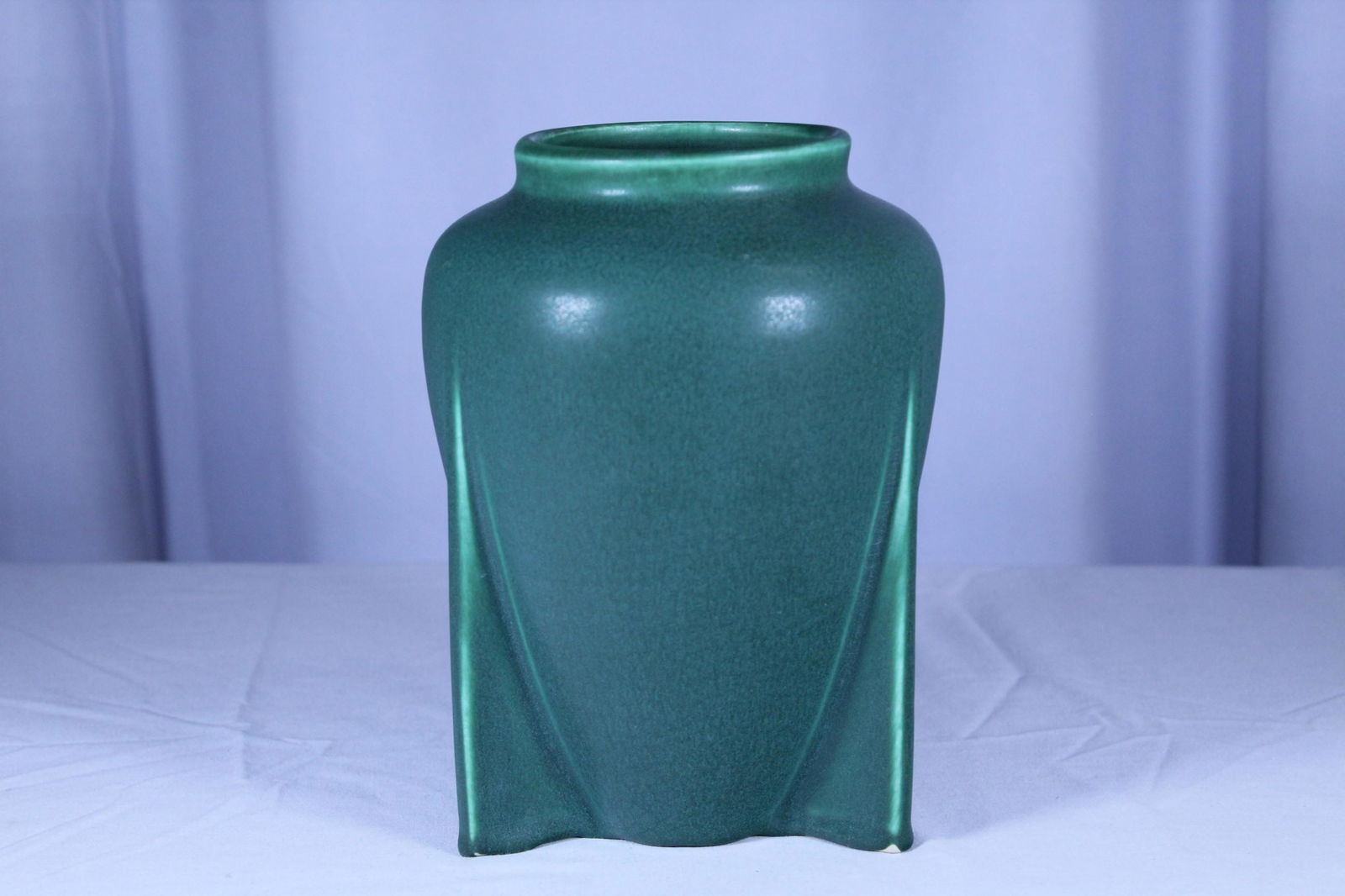 Art and Craft Style Matte Green Vase: This sleek vintage matte green vase measures approximately 8.5 inches tall, and the opening at top is about 3.5 inches. This beautiful vase does have markings on bottom that I can't make out but are p