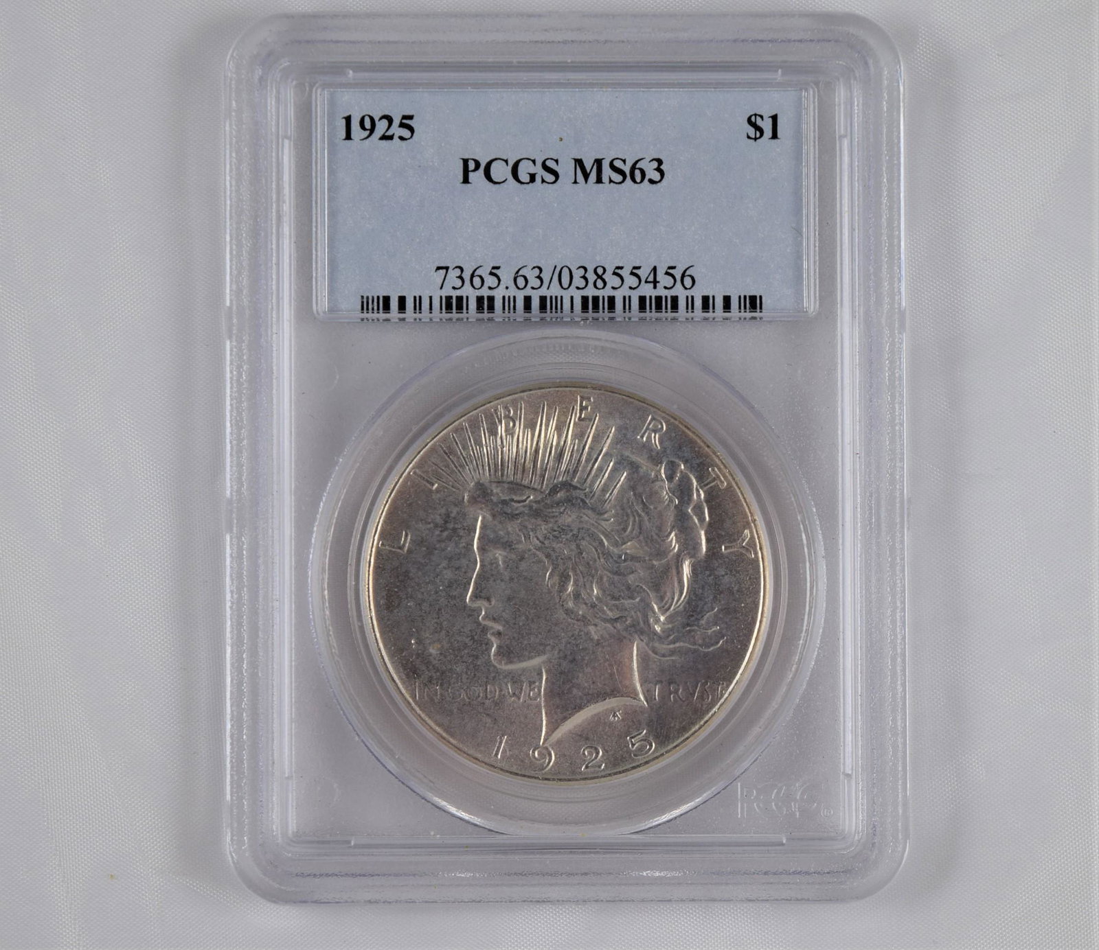 Graded MS63 Peace Dollar: This 1925 Peace Dollar has been graded and authenticated by PCGS as a MS63 1925 Peace Dollar. The obverse and reverse designer is Anthony de Francisci, the coin is composed of 0.900 silver, measuring 