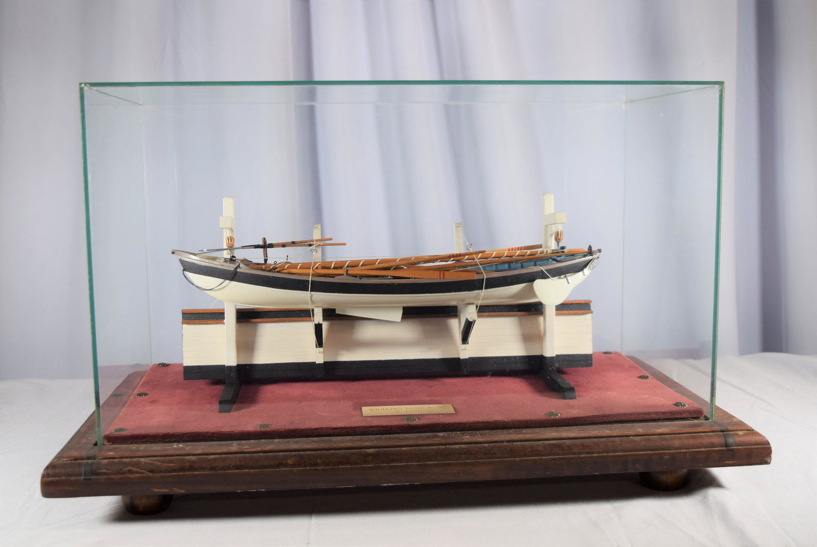 Whaling Long Boat Ships Model: Handcrafted Ships Model in glass case of Whaling Long Boat Cira 1850, in great overall condition. Base measures 22.25 inches long X 12.125 inches wide. As always please see all photos and ask any ques