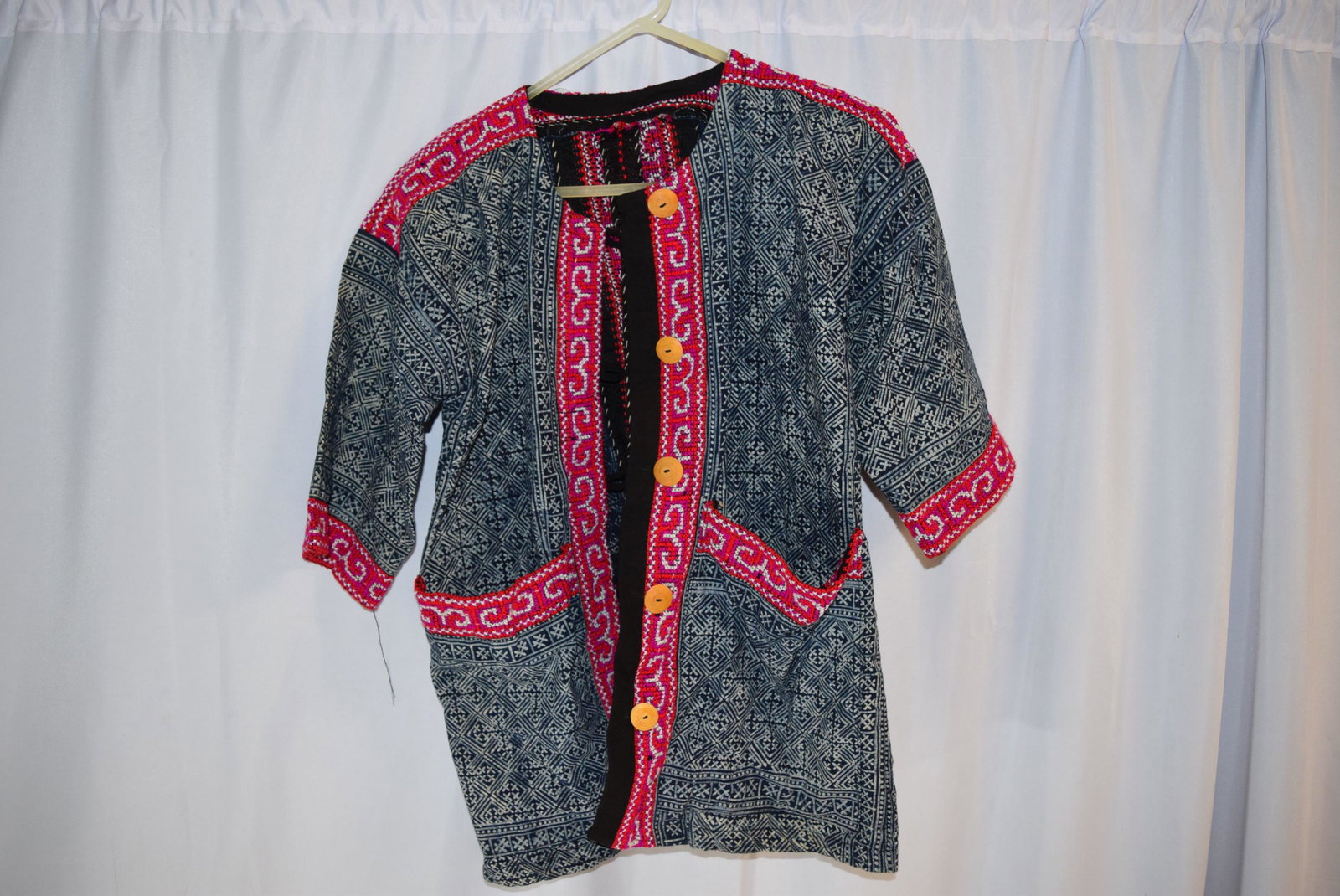 Vintage Handmade Chinese Womens Jackets: This lot includes two womens jackets from Chiang Mai China. Collected in 1950s, one has hand embroidery. The red jacket has a label that reads A Product of Enterprises International Jaipur, Hand print