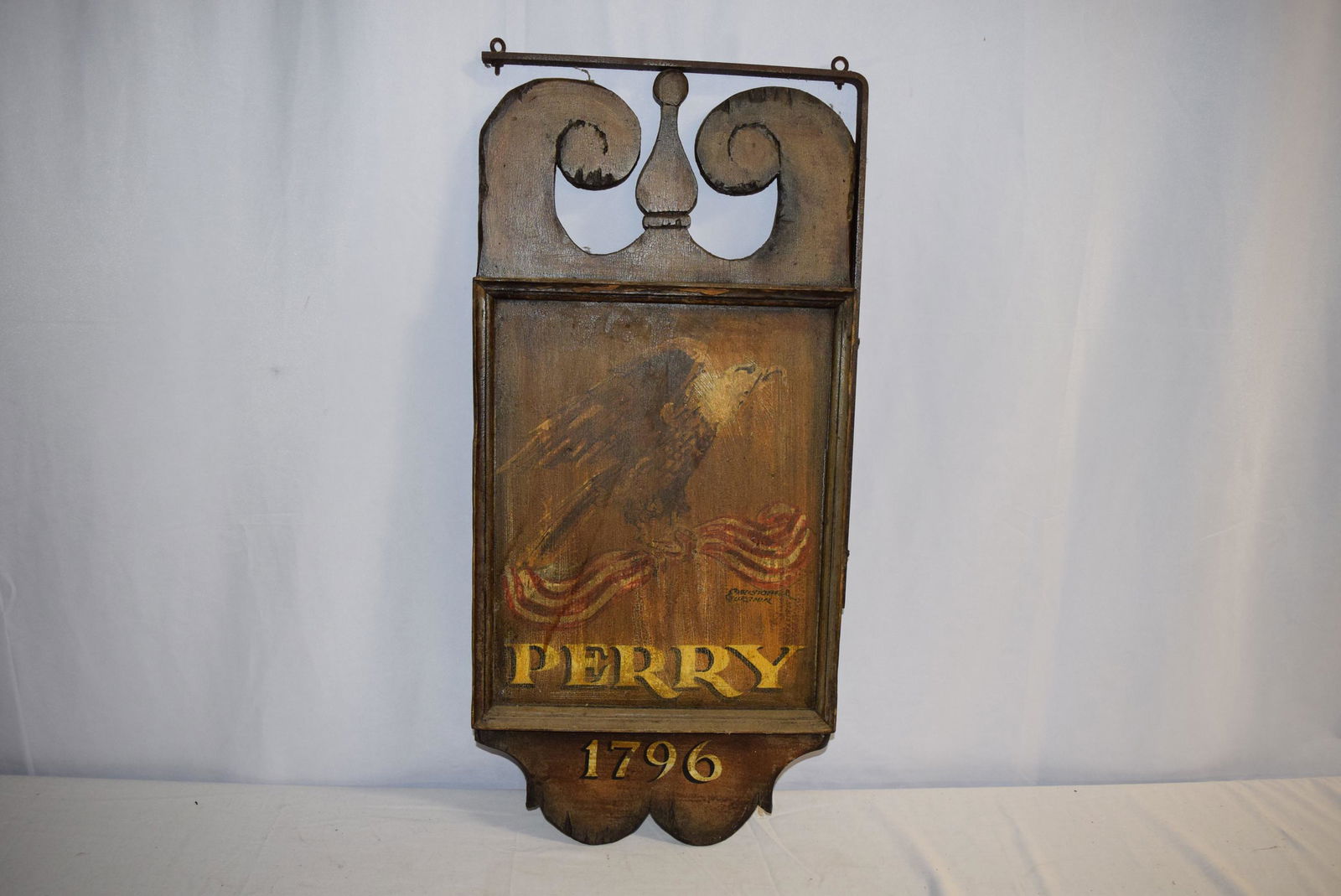 Vintage Wooden Tavern Sign Painted By C. Gurshin: This double sided wooden hanging tavern sign includes original metal bracket for hanging. This is hand painted by Christopher Gurshin and signed by him on both sides. Features an eagle with the word P