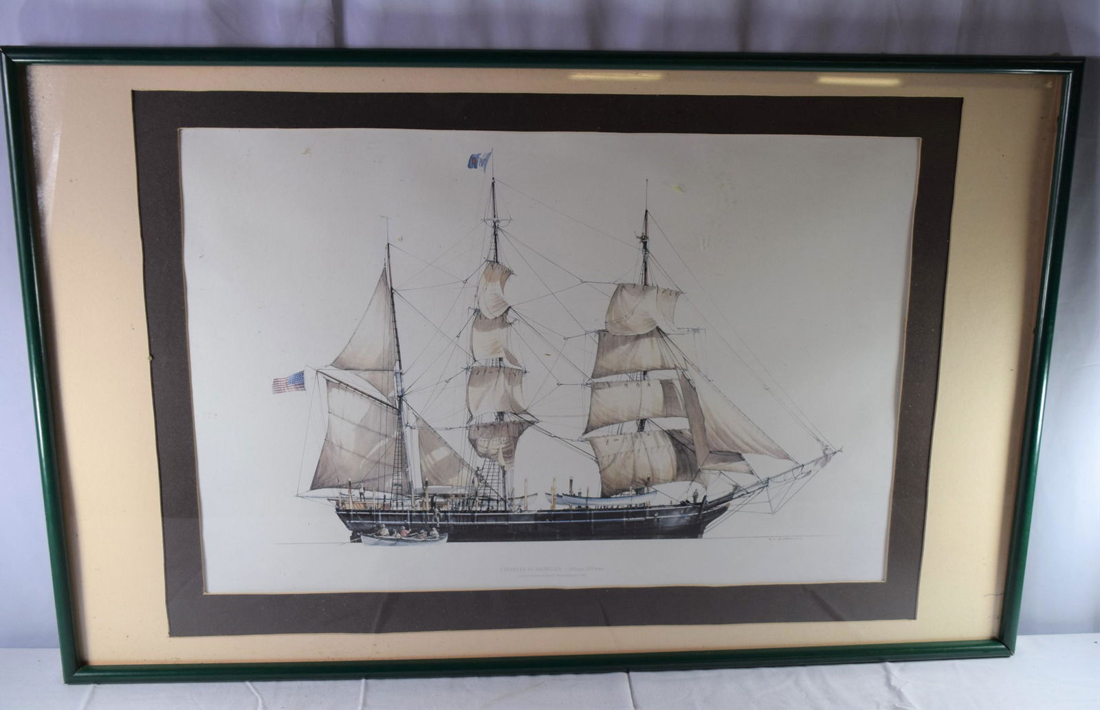 Large Ship Print Signed RN Ghardloin: This large ships print is titled Charles W. Morgan - Whaler 351 tons Launched New Bedford, Massachusetts 1841. This is signed in red in the lower right hand corner RN Ghardloin. This sits in a green f