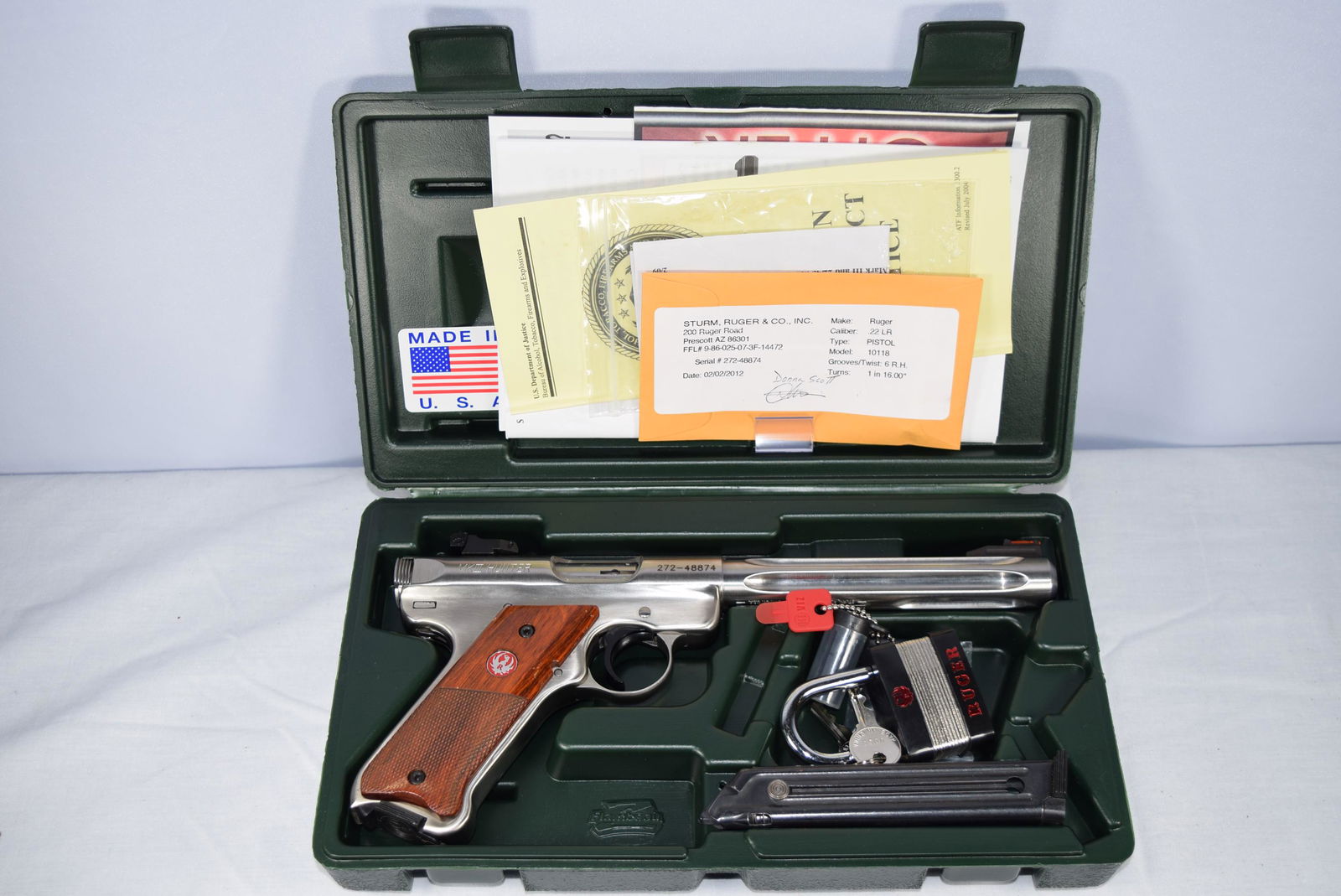 Ruger MK III Hunter Pistol .22 Caliber: This nice gun is a Ruger Model MK III Hunter. Serial Number: 272-48874. Includes original green Ruger hard shell case. .22LR caliber. Barrel measures 6in. This includes in case booklets, gun lock and