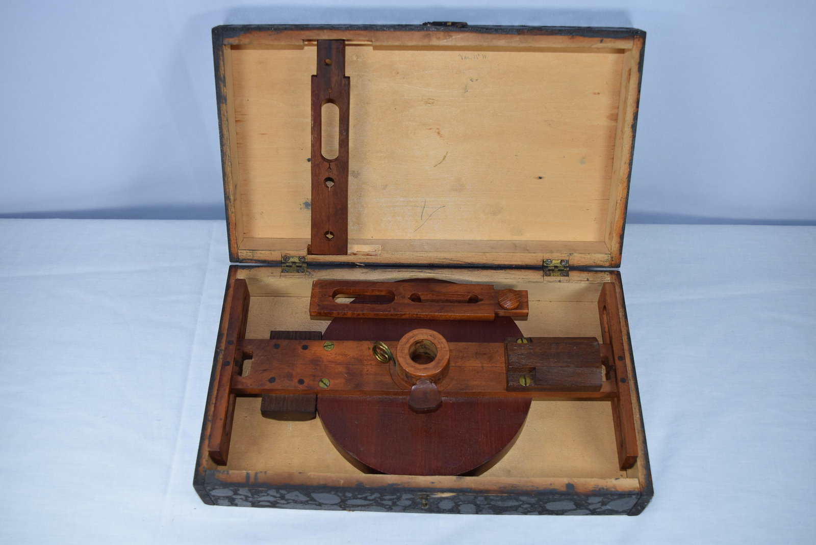 Vintage G. L. Whitehouse Surveyors Compass: Surveyors compass reads on the face G. L. Whitehouse Farmington NH. Measures 11in L x 5.25in W and face is 6in R overall. Comes in wooden case. Appears complete. Photos show exactly what your getting.