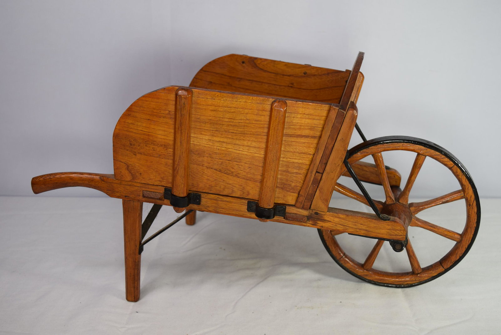 1900s Salesman Sample Wheel Barrow: Beautiful Salesman Sample Size Wooden Wheel Barrow, circa 1900s. Features: Metal accents, detachable sides, metal edged front wheel. It is in great overall condition and has been well maintained throu
