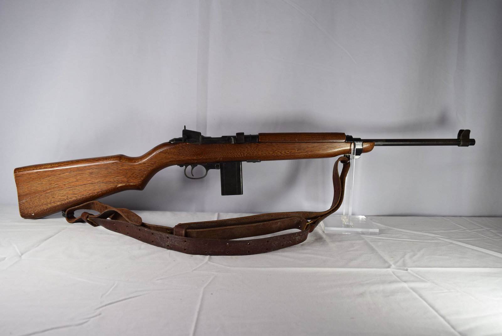 Vintage Crosman Arms Co. M-1 Carbine BB Air Rifle: Vintage BB gun is marked on the barrel M-1 Carbine B-B Air Rifle and the other side Crosman Arms Co. Inc. Fairpoint NY USA. Includes leather carrying strap. Measures 35.5in L overall. Some minor imper