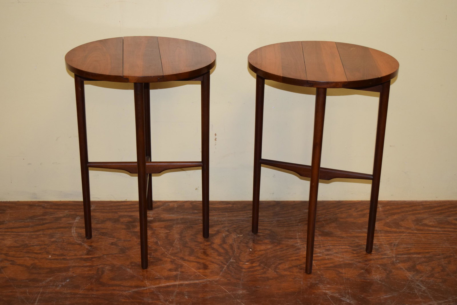 Pair of Mid Century Modern Folding Tables: Matching pair of mid century modern tables measure 23in T x 16.5in R on top opened up. These fold up for easy storage, when folded measure 16in L x 4in W on top. There are a couple scratches and on on