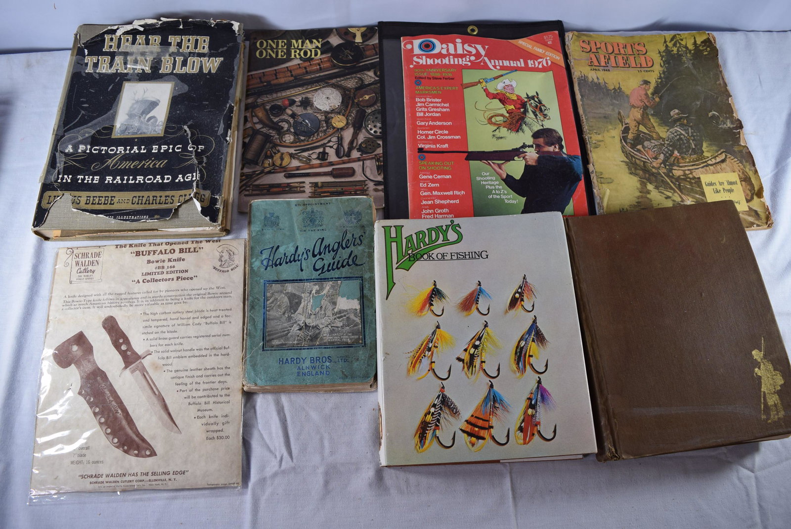 Lot of Misc. Fishing Magazines/Books: Books/magazines in this lot include; One man one rod at the British engineerium. Hardys Anglers Guide 51st edition 1929, Hardy Bros. LTD Alnwick England - binding is loose and has water marks and ware
