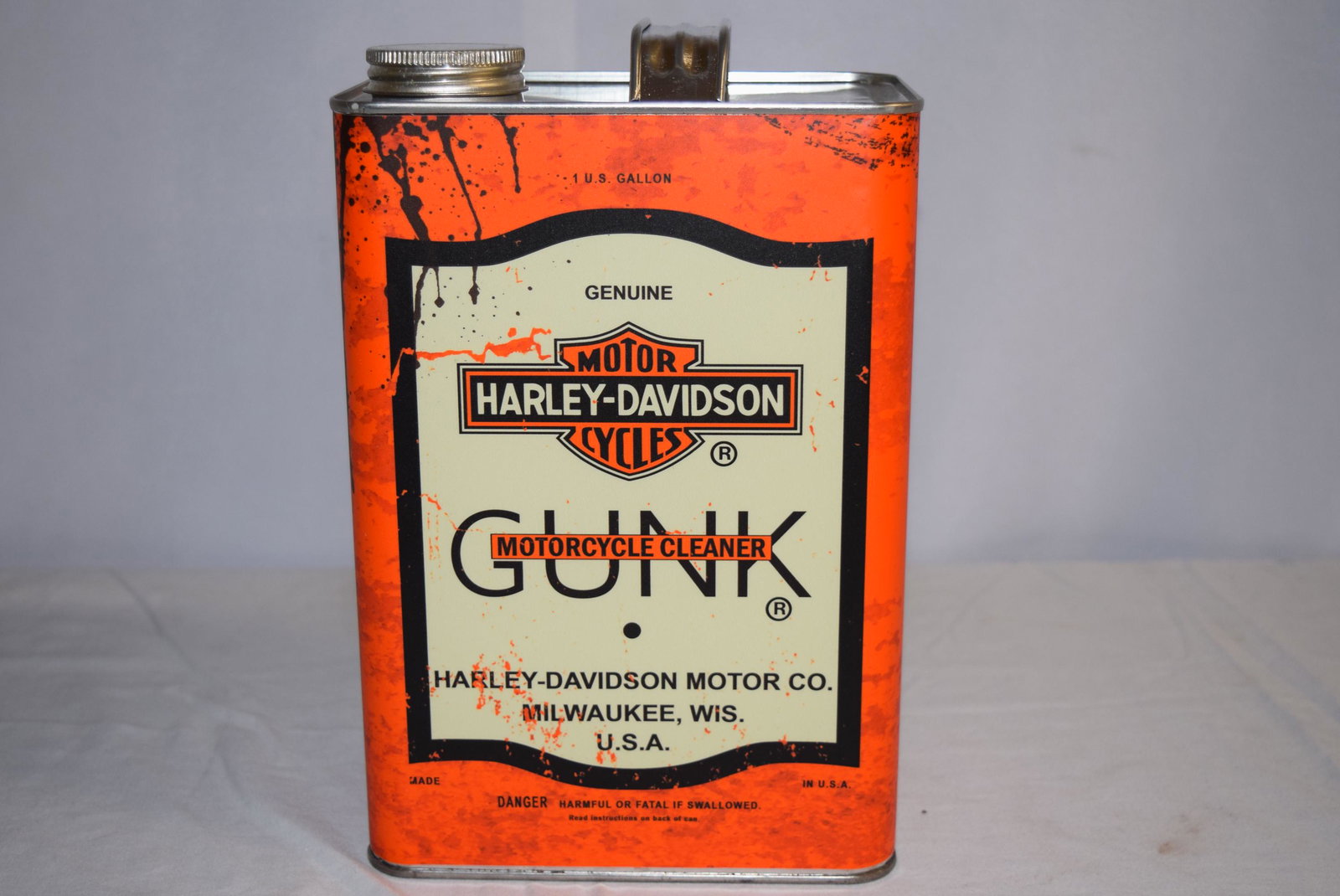 Harley Davidson 1G Motorcycle Cleaner Can: This Harley Davidson Gunk Motorcycle Cleaner is a 1 gallon can. This is in excellent condition with no damage or repairs seen. Appears to either of been cleaned of never had product in it as it is spo