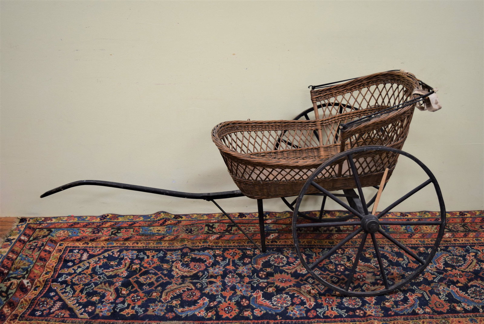 Late 1800s Childs Wicker Carriage: Antique late 1800s child wicker carriage measures 29in T not including canopy x 19in W not including wheels x 30in L not including handle. Measures 25.25in W wheel to wheel x approx. 59in L from back 