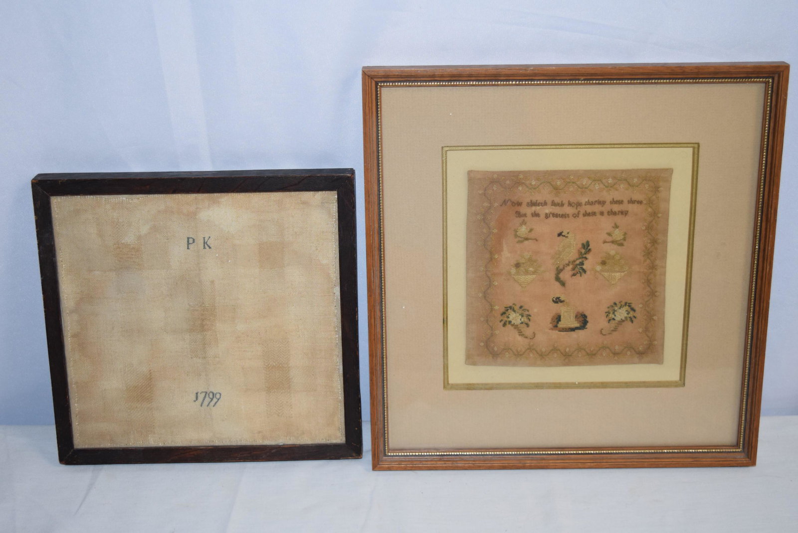 Two Early Samplers: This lot includes a sampler dated 1799 and has the initials PK, the fabric has some discoloration. Measures approx. 9in x 9.5in overall. The second sampler is very small, there are words however I can