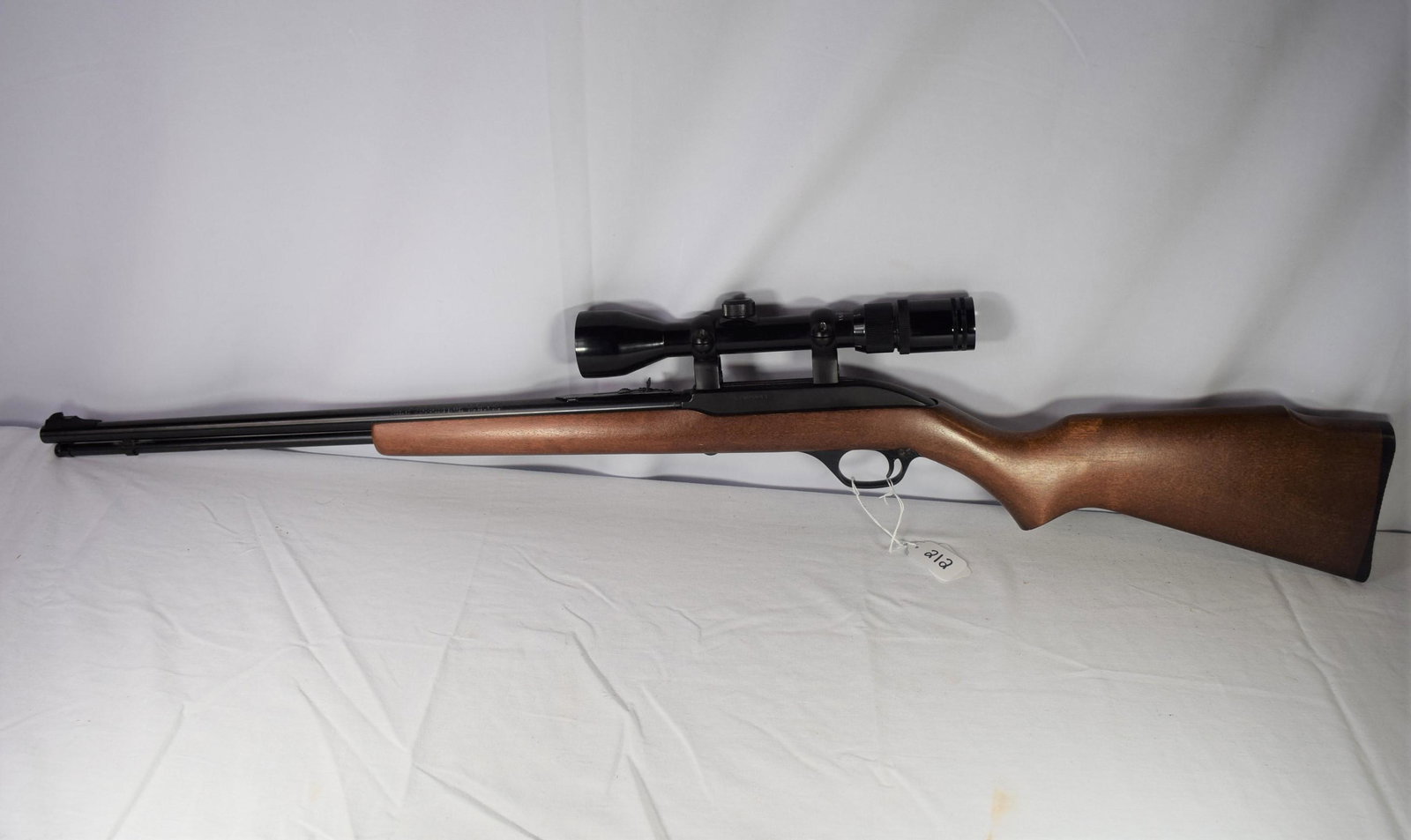 Marlin Model 60 Rifle .22 LR: Marlin Model 60 rifle .22 LR, Serial Number: 17380883. Micro groove barrel, tellstar zoom scope, semi auto. 22 inch barrel. Front and rear sights. Lettering is sharp. Excellent stock. Bore clean and i