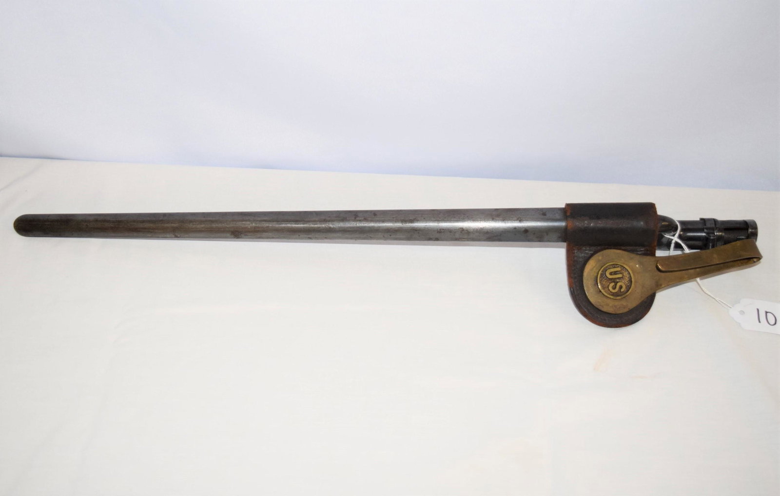 Civil War Bayonet with Scabbard: Civil War bayonet for MOD. 1873 Springfield trapdoor, comes with metal scabbard and leather frog with US hanger attached. Bayonet measures 22in L overall. Embossed US on the blade. Appears in great ov