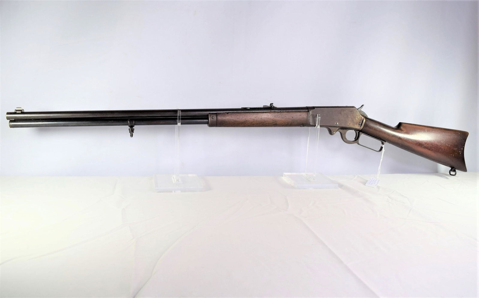 Marlin Model 1893 Rifle 30-30 CAL: Marlin model 1893 rifle 30-30 caliber. Serial Number: 449658. Barrel measures 26in L. Lever action. Embossed special smokeless steel. Patd dates on barrel Oct. 11, 1887 April 2 1889 Aug. 1 1893. Front