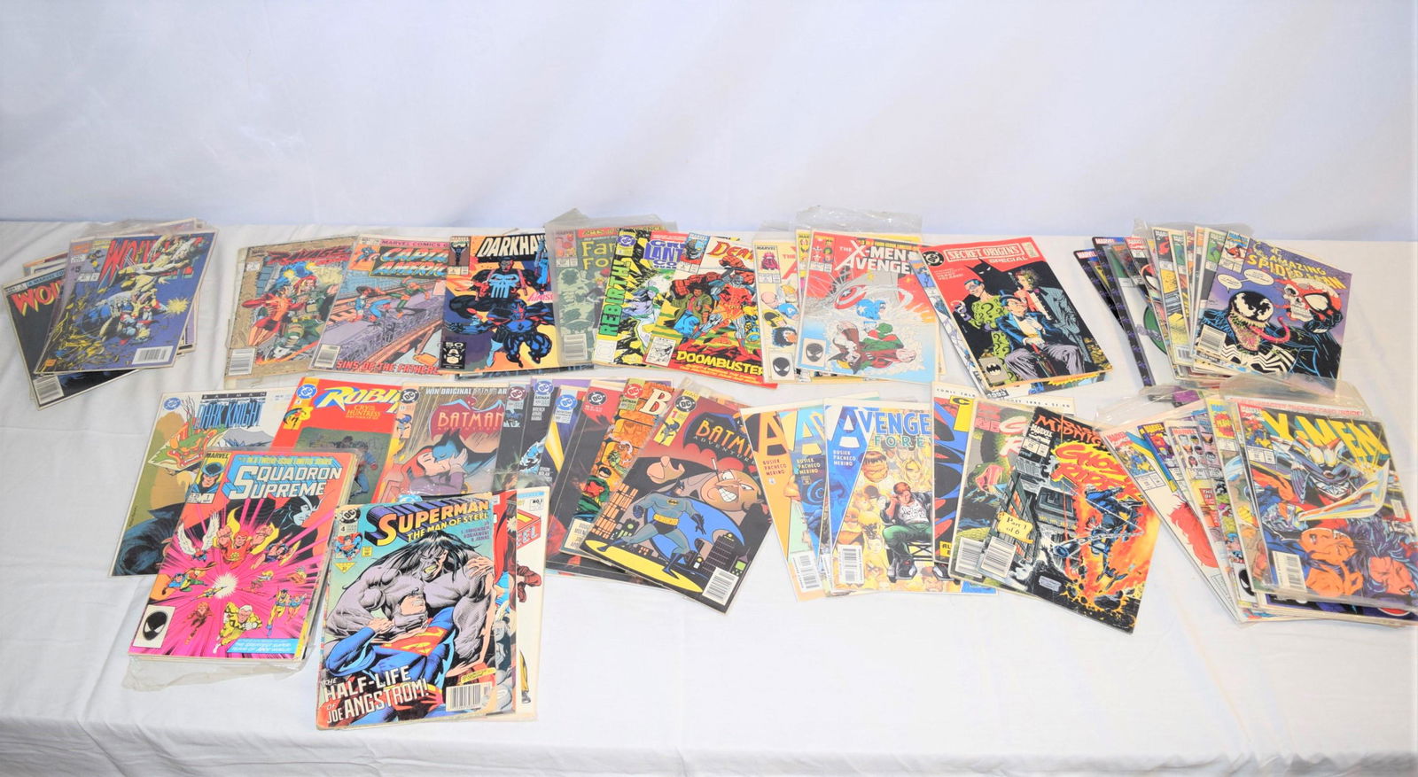 Large Lot of Vintage Comic Books: This large lot of comic books includes approx. 100 comics. Lot consist of 12 Wolverine comics, 19 X-MEN comics, 8 Superman The Man of Steel, 12 Squadron Supreme, 2 Ghost Rider, 20 The Amazing Spiderma