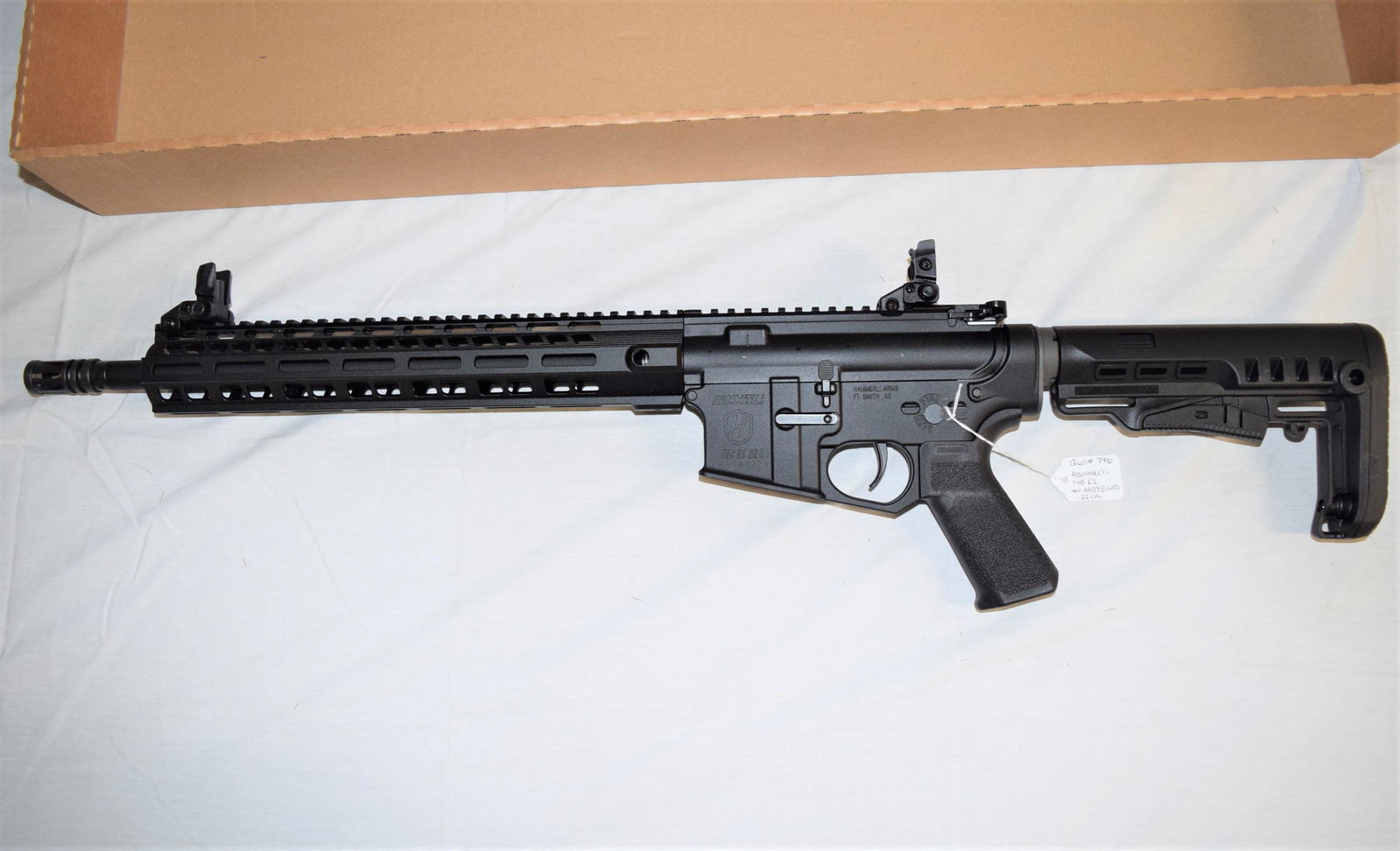 NEW Hammerli TAC R1 Rifle .22 LR: NEW Hammerli TAC R1 Rifle .22 caliber. SN: HA038320. BARREL: 17in L. Comes in original box with clip, informational booklet, tool, and gun lock. Excellent condition with no issues known to us. Great f