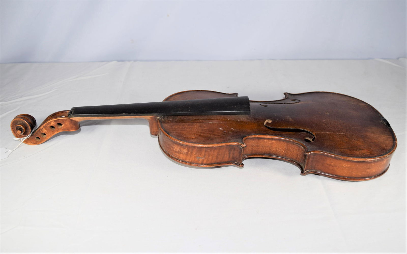 German 3/4 Violin: German 3/4 violin labeled L. Fritz Heberlein. Circa 1901. Poorly repaired top crack, needs restoration. 13 1/4in. As always please see all photos for more detail and ask any questions prior to bidding