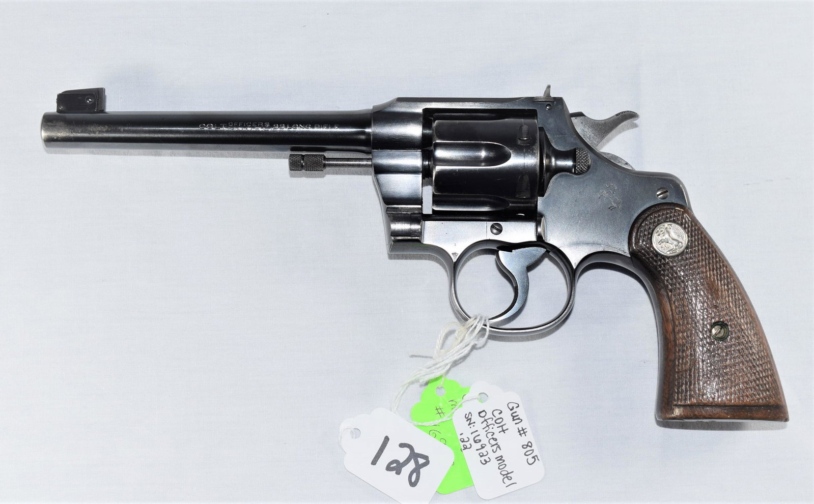 Colt Officers Model Revolver .22: Colt Officers Model Revolver .22 caliber. SERIAL NUMBER: 16923. Made in 1937. Barrel length: 6in L. Lettering and colt stamp are sharp. Grips in excellent condition. Bore and rifling in good condition