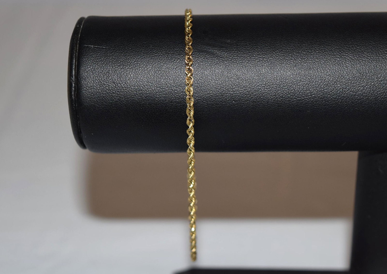 14K Yellow Gold Rope Chain Bracelet: 14K Yellow Gold Rope Chain Bracelet measuring 8 inches in length overall and weighing approximately 2.8 grams. Bracelet is marked, not tested, 14K on the clasp as shown in photos. Beautiful simple rop