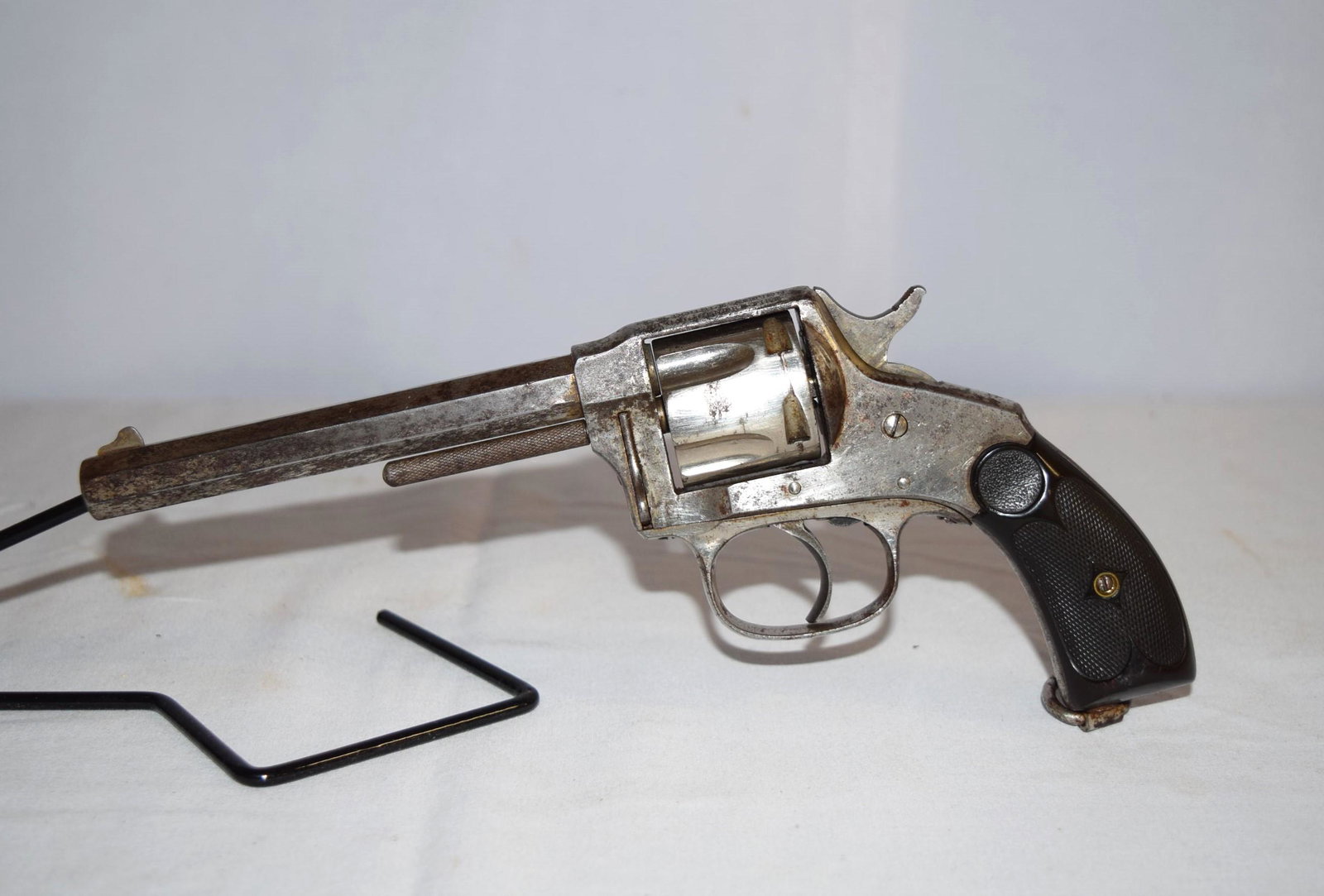 Hopkins & Allen Mfg and Co. XL Double Action .38 Cal Revolver: Hopkins & Allen MFG CO. X.L. Double Action .38 Cal Center Fire Revolver. Serial Number (on cylinder, see photos): 8447. 5 Round. Barrel Length: 5 Inch. Embossed "PAT MAR 28. 71 JAN 5. 86". Some pittin