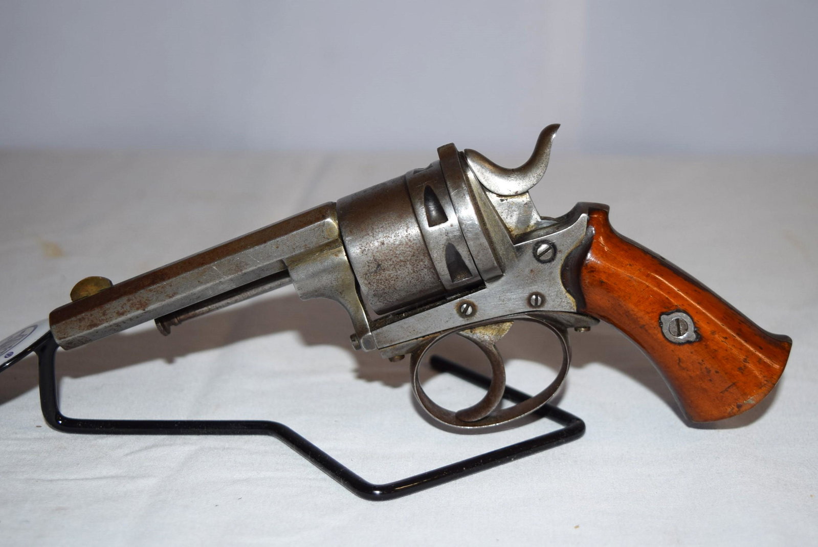 Octagon Barrel Revolver: Octagon Barrel Revolver with Wooden Pistol Grips has a 3.25-3.5 inch Octagon Barrel. Embossed "JD" on the cylinder, as shown. Appears to be in good overall condition with wear consistent with age. App
