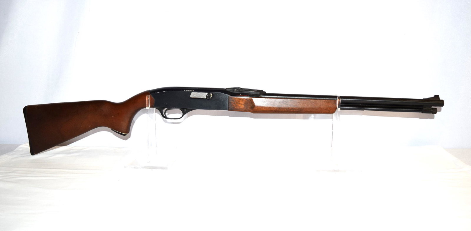 Winchester Mod 290 .22 Cal Rifle: Winchester Mod 290 .22 Cal SL or LR Rifle. Barrel Length: 20 Inch. Serial Number: 148368. Features a Wood Stock and Forestock. Mfg between 1965-1973. Shows some wear but is in good overall condition, 