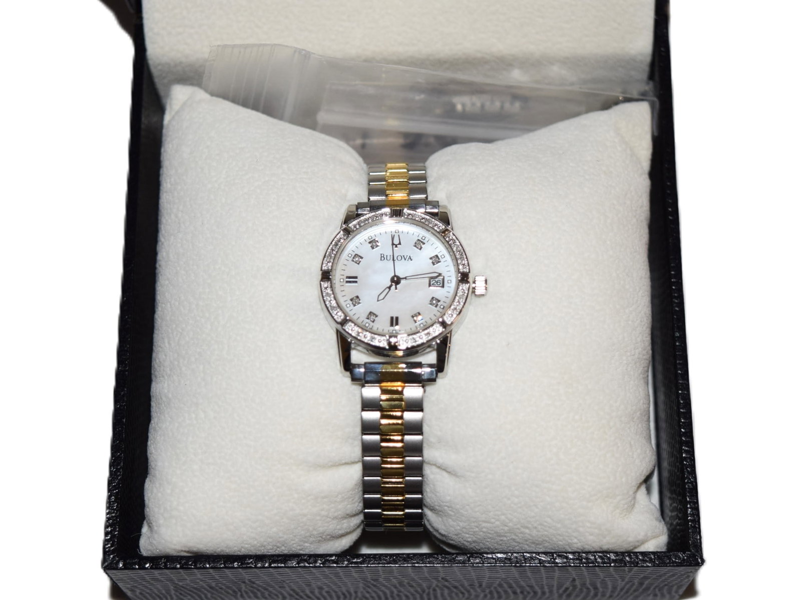 Bulova Womens Wristwatch: Bulova Womens Wristwatch. Watch is engraved on the back "65 Its only a number". Stainless Steel and Water Resistant. Appears to be in good condition overall and would display well on the wrist. Great