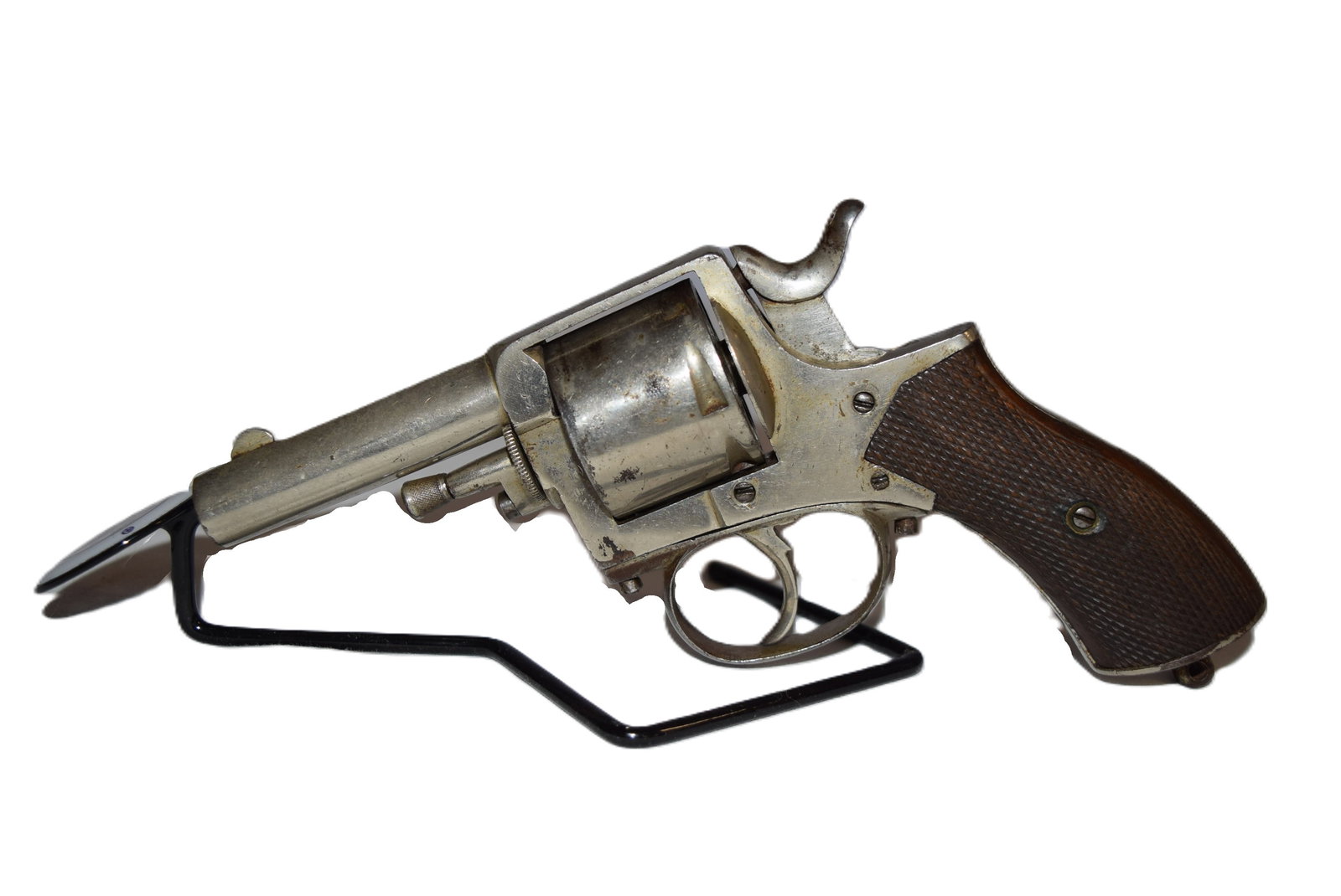 Belgian .38CAL Revolver: Belgian .38CAL Revolver. Wooden checkered grip. Barrel Length: 3 Inches. Serial Number: 1026. Wear seen throughout consistent with age and use, otherwise appears to be in fair condition overall for it