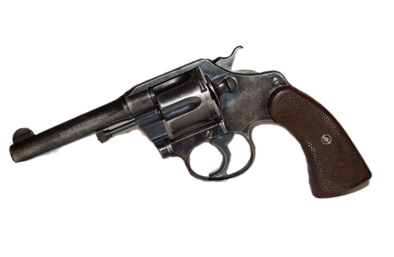 Colt Police Positive 38 Revolver: Colt Police Positive 38 Revolver. 6 Round Revolver. Serial Number: 4233. Barrel Length: 4 Inches. Checkered pistol grip. Marked " Colts PT FA MFG CO Hartford CT USA PATD AUG 5 1884 JUNE 55 1900 JULY 4