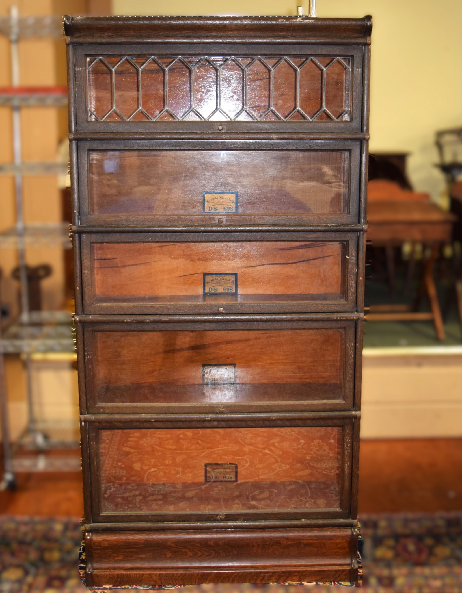 The Globe-Wernicke Co. Size D-8 1/2 Five Stack Bookcase: The Globe-Wernicke Co. Size D-8 1/2 Five Stack Bookcase measures approximately 68.5 inches tall X 33.75 inches wide X 11 inches deep on shelves X 12.5 inches deep on base. Manufacturers tags are still