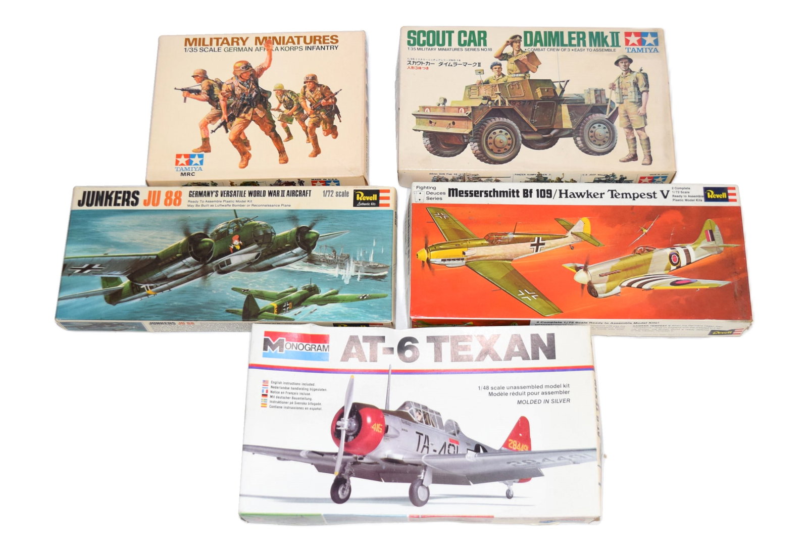 Lot of Five Scale Model Kits in Original Boxes: Lot of Five Scale Model Kit in Original Boxes, to include: Monogram AT-6 Texan 1/48 Scale Unassembled Model Kit, Revell Messerschmitt Bf 109/ Hawker Tempest V 1/72 Scale Plastic Model Kit, Revell Junk