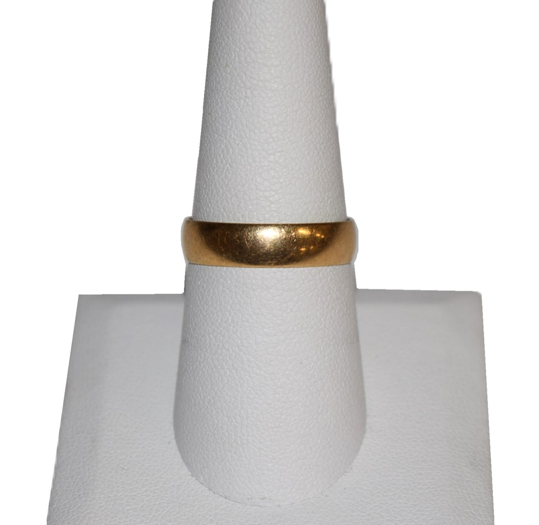 14K Yellow Gold Chunky Wedding Band: 14K Yellow Gold Chunky Wedding Band currently measures a size 8.75 and weighs approximately 2.8 grams. Ring is marked, not tested, 14K on the inside of the band. This simple thick band makes the perfe