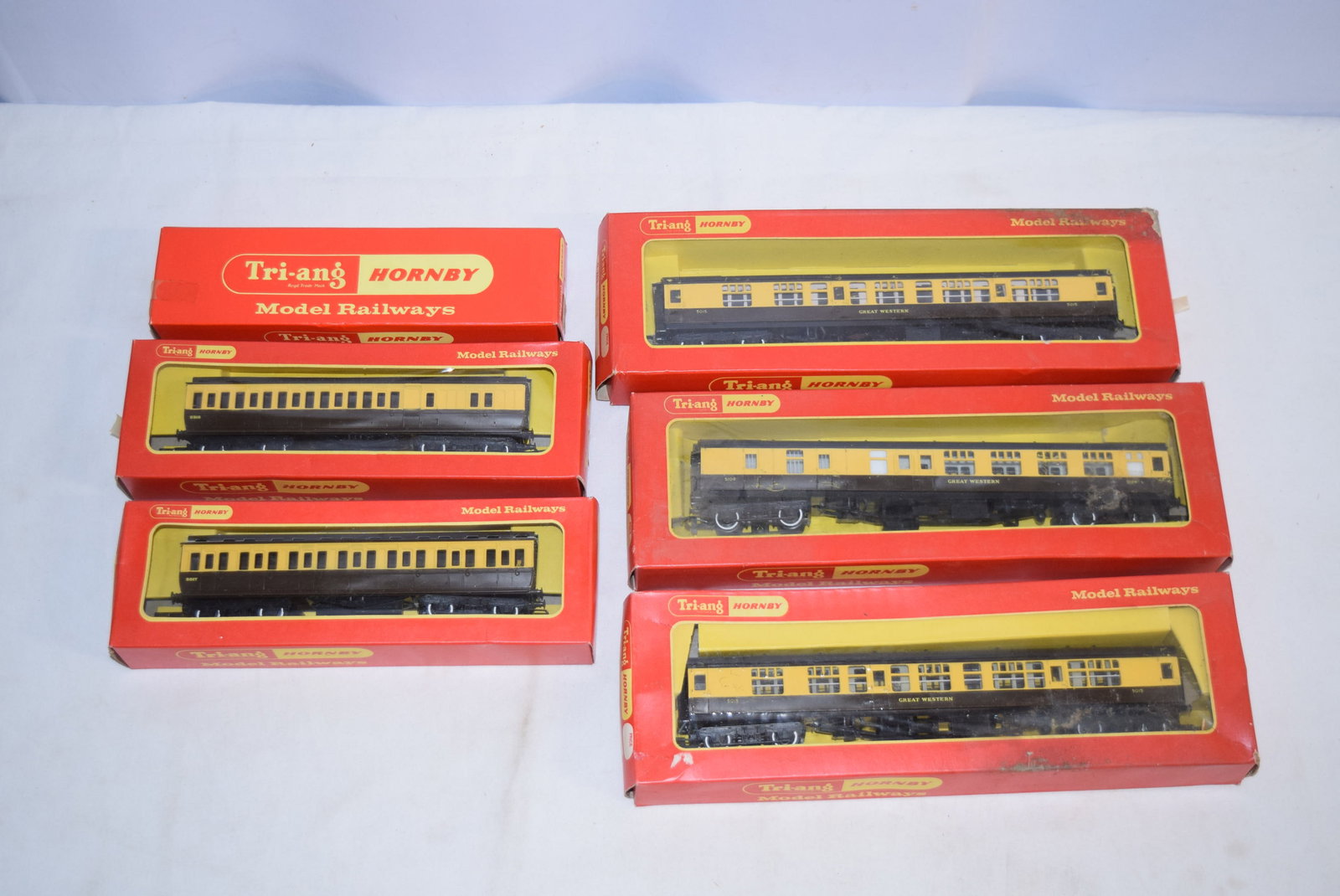 Lot of HO Gauge Triang/Hornby Model Railways in Original Boxes: Lot of HO Gauge Triang/Hornby Model Railways in Original Boxes includes: "R744A G.W.R. Brake 3rd Coach With Seating", "R. 743A G.W.R. Composite Coach With Seating", "R743 Composite Coach With Seating"