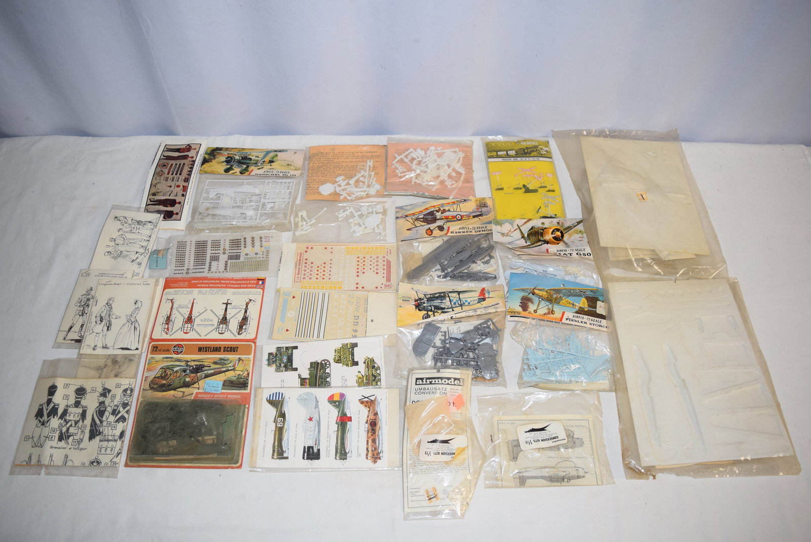 Large Lot of Miscellaneous Model Kits: Large Lot of Miscellaneous Model Kits includes several model plane kits, train accessories and more. Please review all photos as all items pictured are included in lot. Great lot to add to or start yo