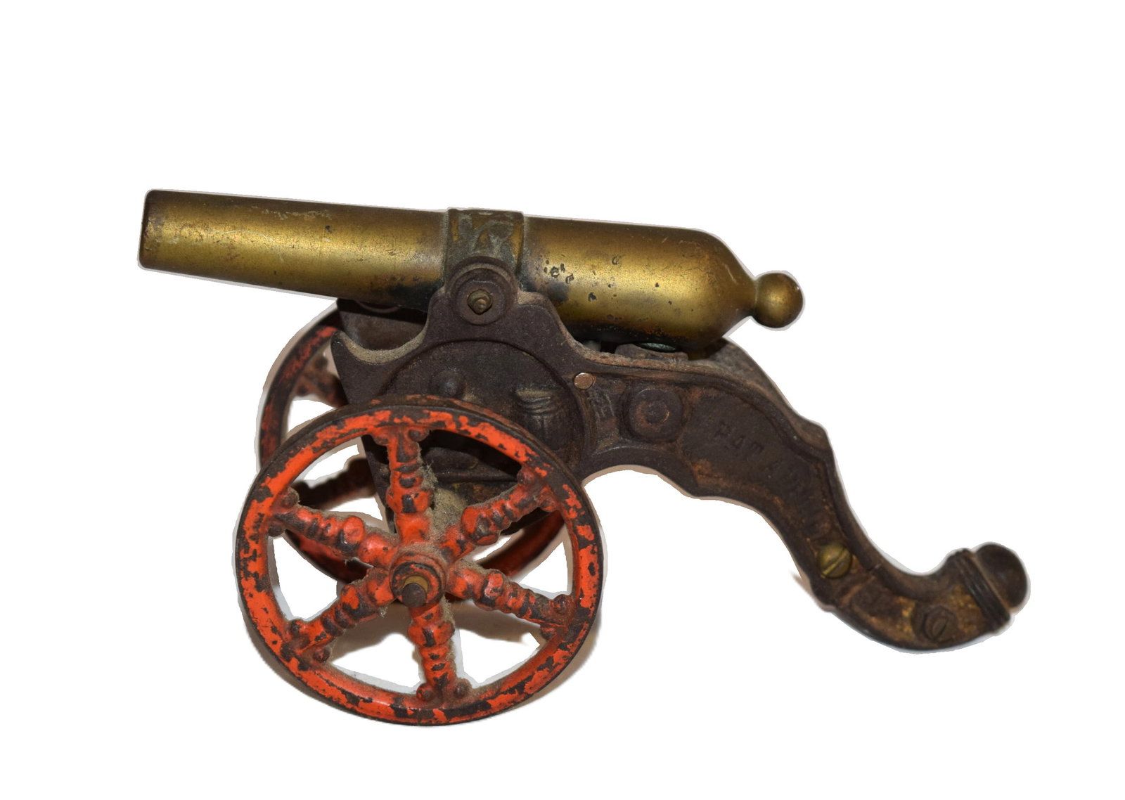 Antique Brass and Cast Iron Signal Canon: Antique Brass and Cast Iron Signal Canon measures approximately 4 inches tall X 7.5 inches long X 2.75 inches round on wheels X 3 inches from wheel to wheel. Appears to have normal wear and imperfecti