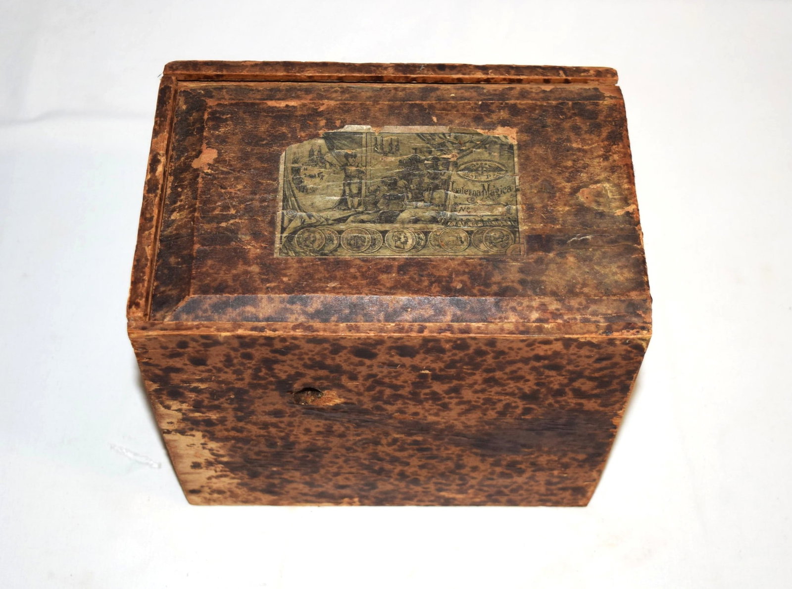 Antique Magic Lantern Projector with Slides: Antique Magic Lantern Projector with Slides measures in box 7.5 inches tall X 8.5 inches long X 5.75 inches wide, projector itself measures 7 inches X 3 inches, and slides measure 6 inches X 1.5 inche