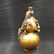 A GILT BRONZE DOUBLE GOURD BOTTLE STATUE QIANLONG MARK