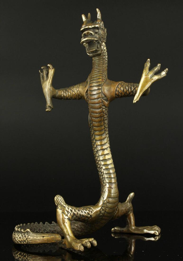 A GILT BRONZE DRAGON STATUE MING DYNASTY.: HEIGHT 23/CM WIDTH 12.5/CM