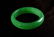 A NATURAL GREEN JADE BANGLE. - 2