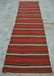 A VINTAGE AFGHANI HALLWAY NOMADIC KILIM RUNNER.