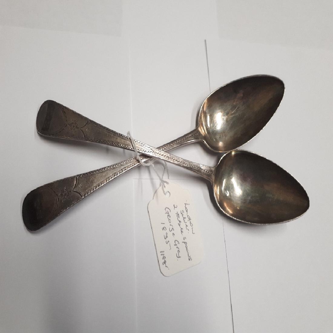 Pair of English silver table spoons. Hallmarked in: Pair of English silver table spoons. Hallmarked in London 1835. George Gray