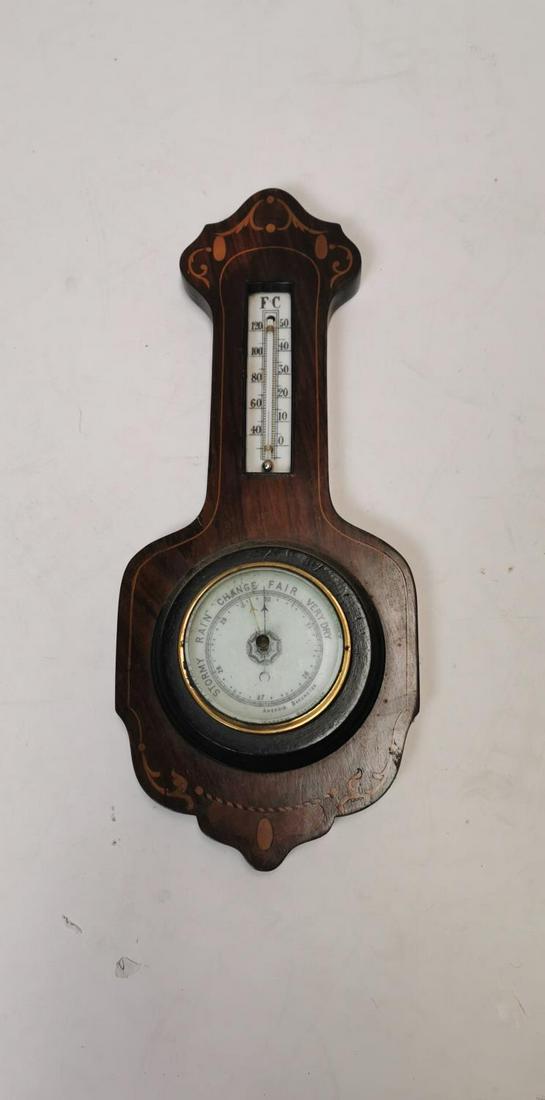 Edwardian inlaid rosewood barometer.: Edwardian inlaid rosewood barometer {45 cm H x 20 cm W}.