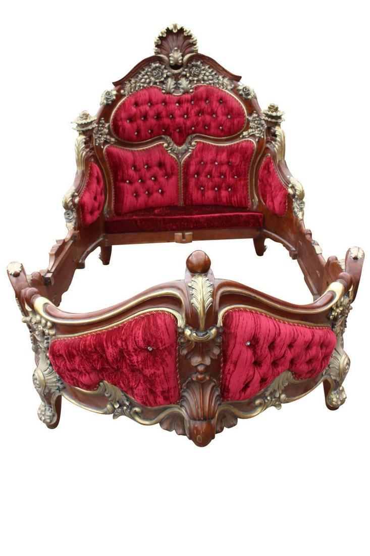 Decorative mahogany and gilt bed frame.: Decorative mahogany and gilt upholstered deep buttoned bed frame in the Titanic style {173 cm H x 160 cm W x 244 L}.