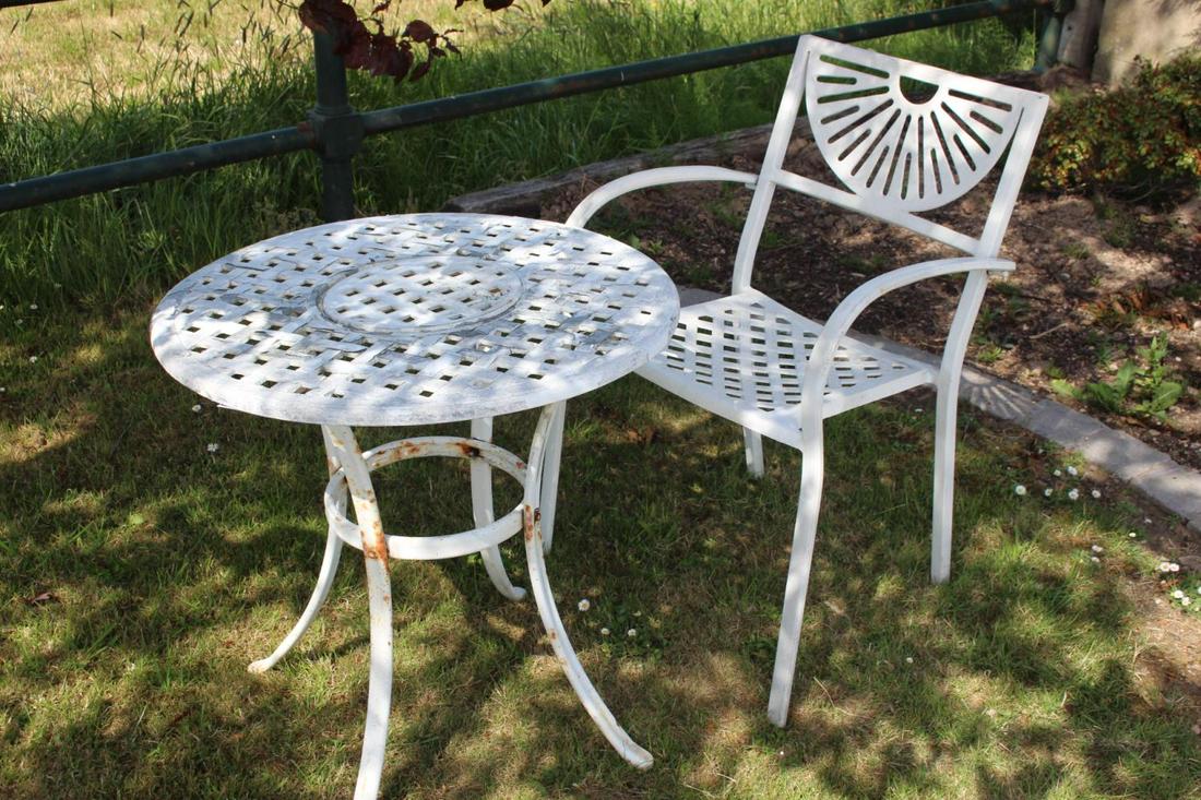 Aluminium garden table and chair.: Aluminium garden table {66 cm H x 65 cm Dia.} and chair {84 cm H x 54 cm W}.