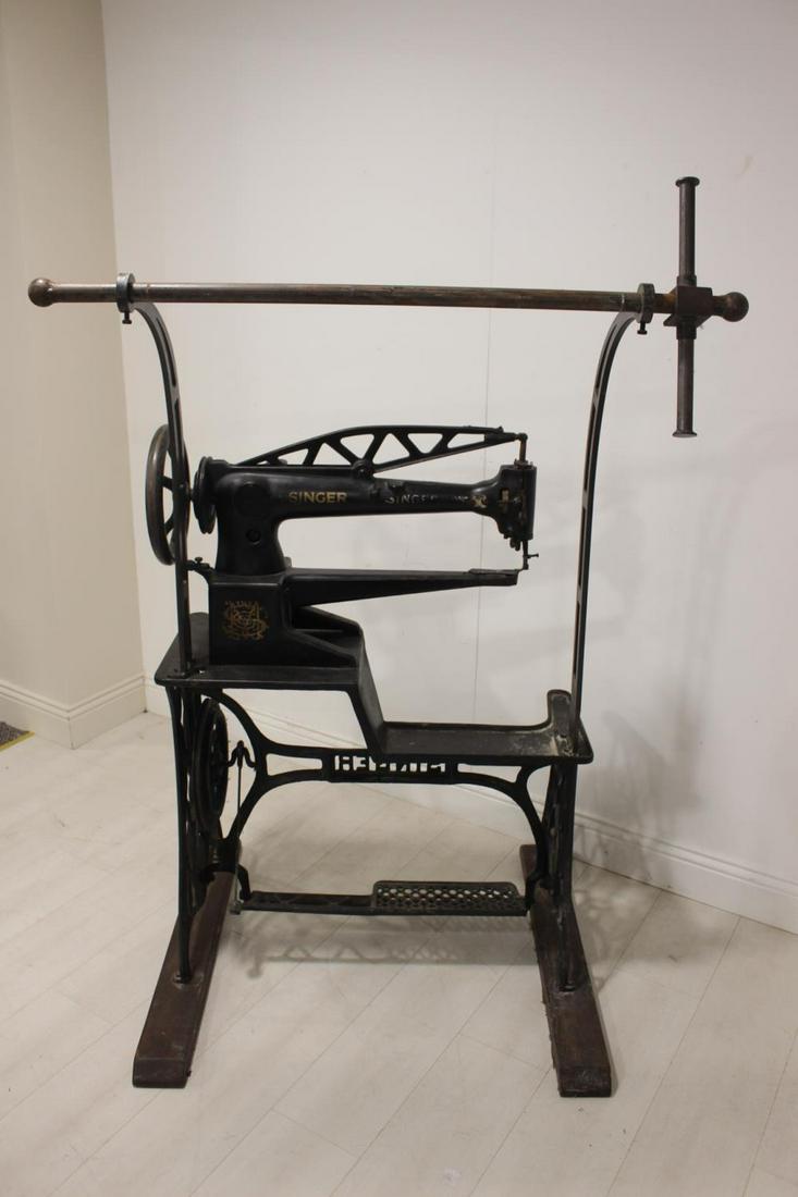 Industrial Singer sewing machine.: Industrial Singer sewing machine. { 144cm H X 98cm W X 80cm D }.