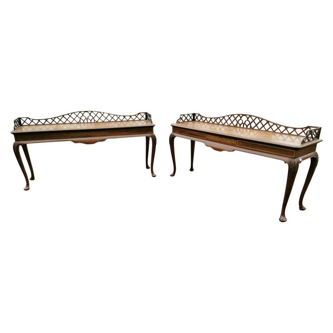 Pair of Edwardian rosewood side tables: Pair of Edwardian rosewood side tables, the open work gallery back above brass inlaid frieze raised on Queen Ann style legs with acanthus leaves on the knee. { 87cm H X 184cm W X 49cm D }.