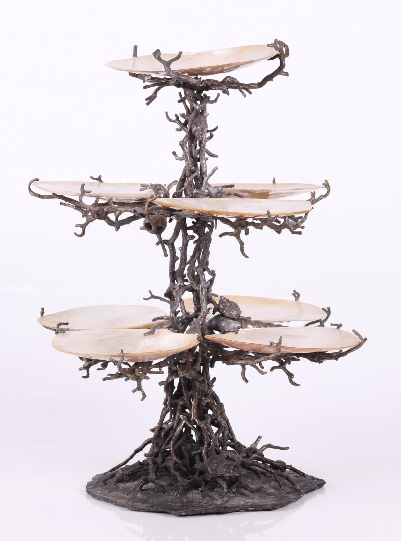 Maitland Smith Three Tier Epergne: Silver plate coral form shell decorated epergne with eight mother of pearl oyster shell form trays. With original paper label. Dimensions: 13" at the widest, 16 1/2" in height. Provenance: From a Ches
