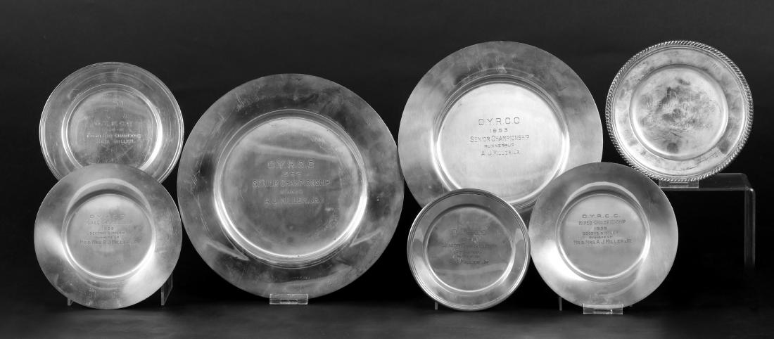 A Group of Sterling Silver Plates, Sports Trophies: Eight plates, dated between 1939 and 1954, eight are related to the Old York Road Country Club. Dimensions: The total approximate weight is 49 troy ounces. The diameters range from 6" to 9 1/2". Prove